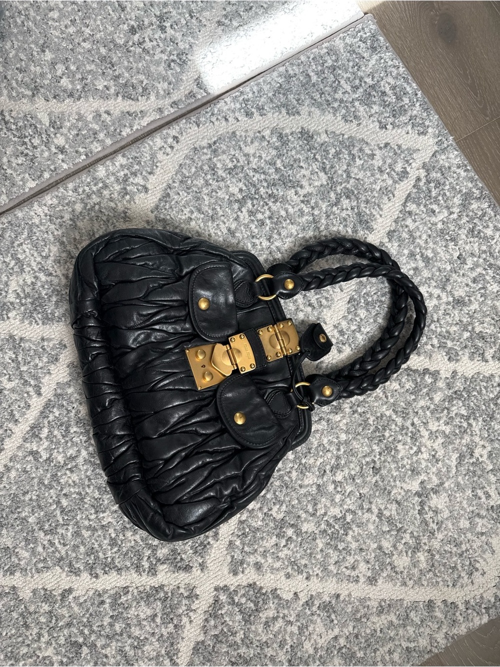 Miu Miu Black Quilted Shoulder Bag with Braided Handles and Gold Hardware